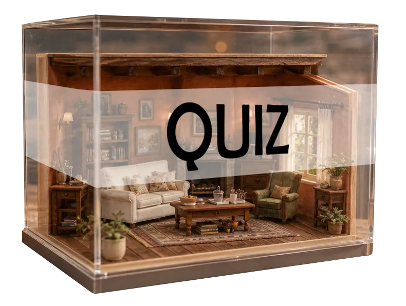 A miniature living room inside a clear display case with the word Quiz across the glass
